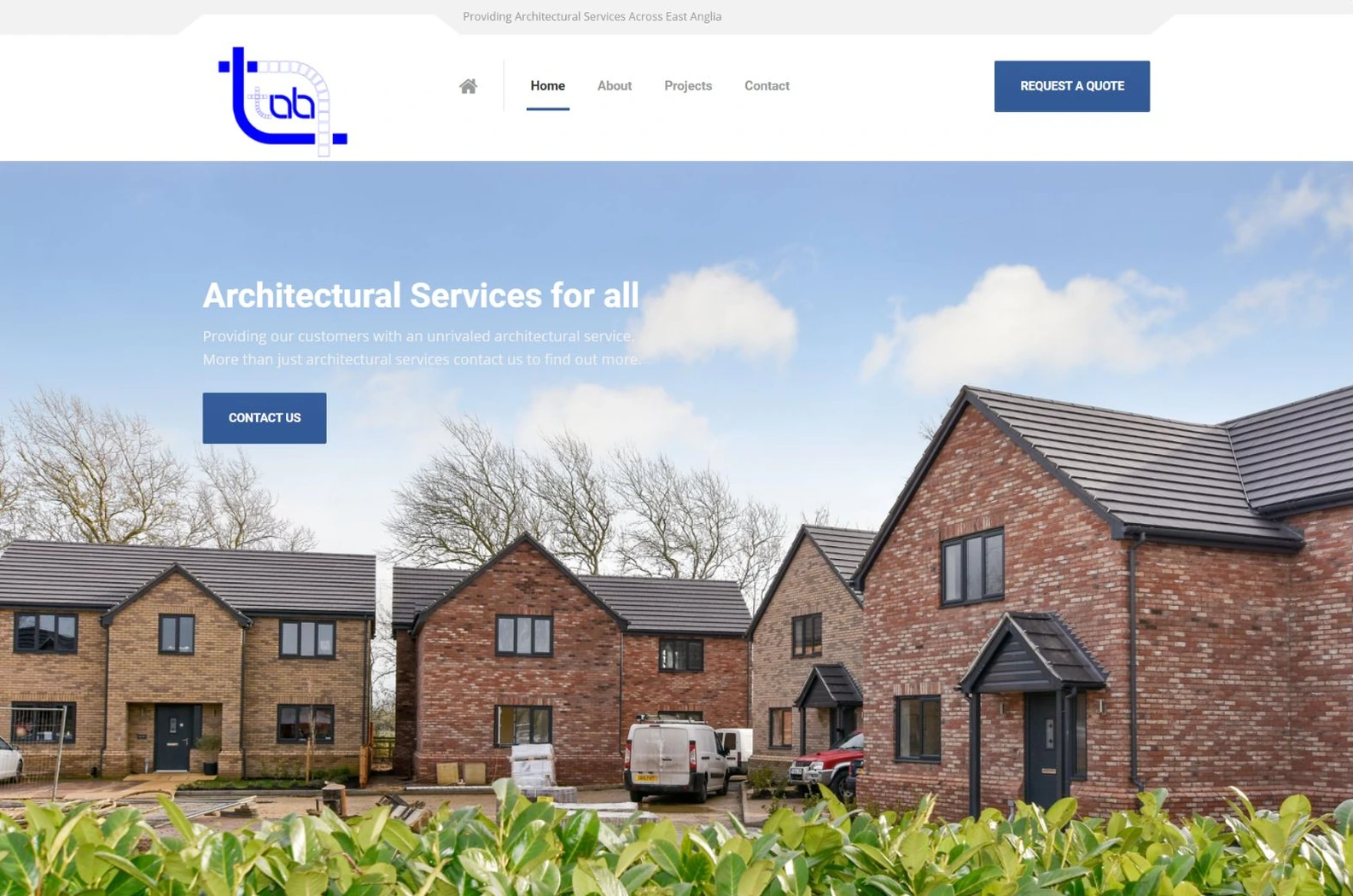 TAB Architecture homepage presented in a laptop mockup